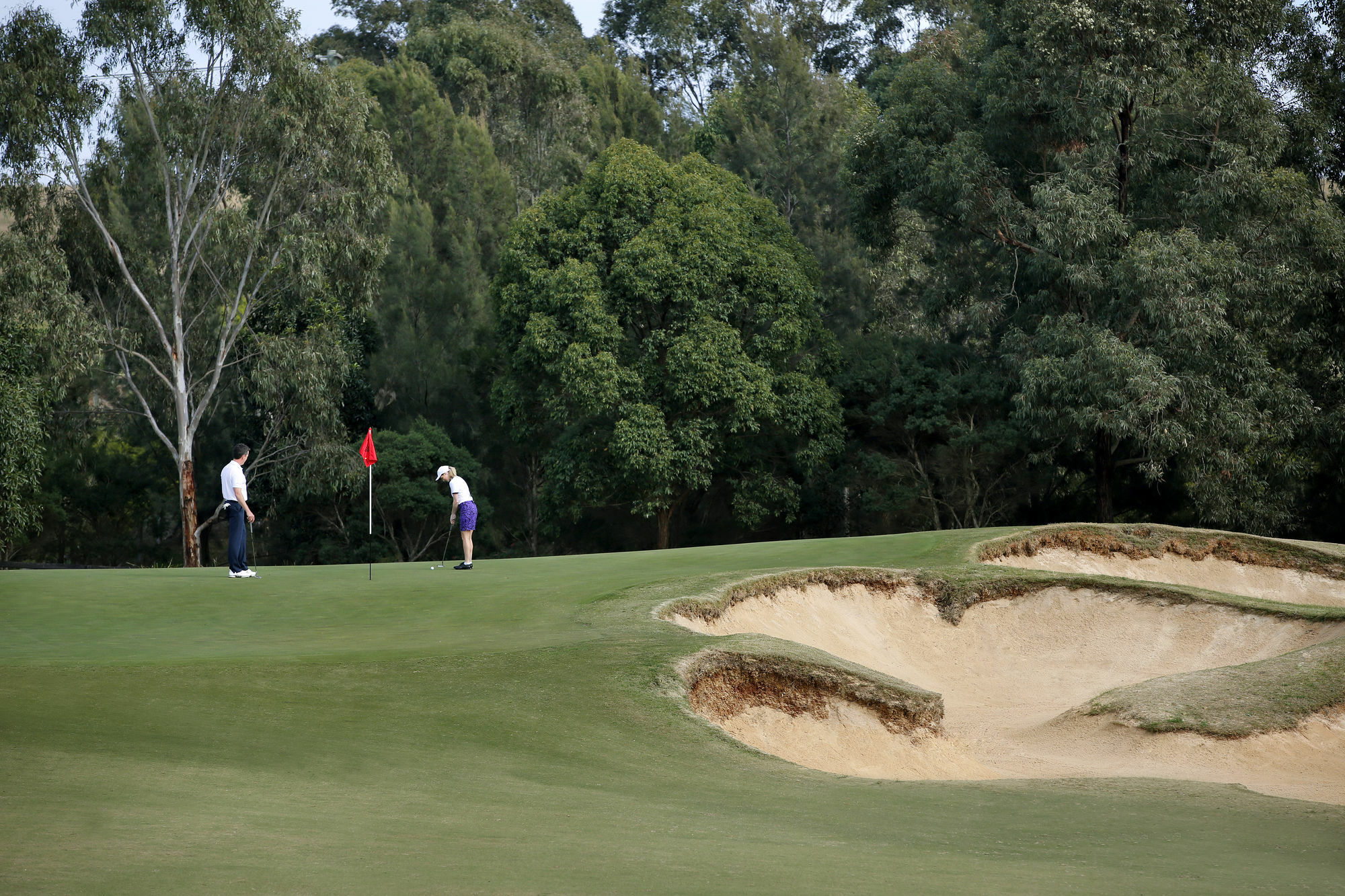 Chateau Elan At The Vintage Поколбин Екстериор снимка Golfers on the green of the 12th hole at the 2006 PGA Championship